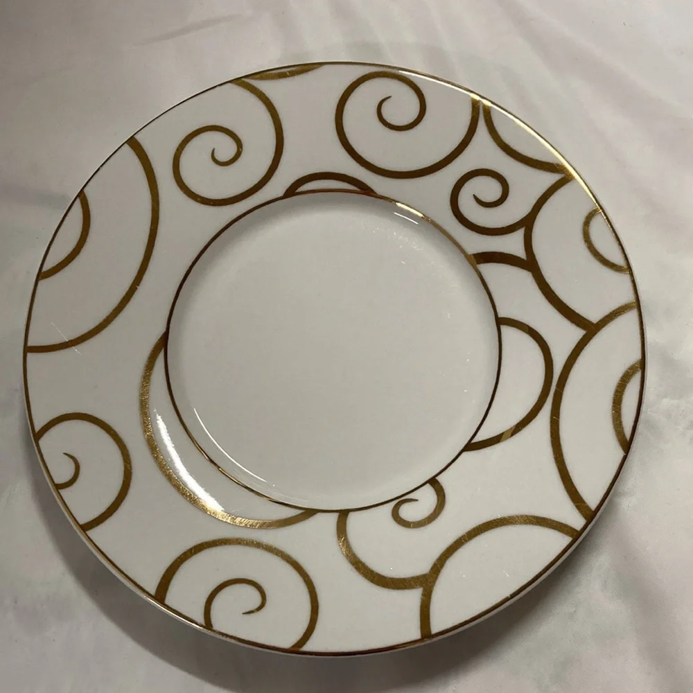 Pier 1 Gold Swirl Porcelain Cup and Saucer Set